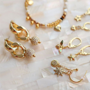 Schmucksets Beeindruckenden Schmuck mit Perlen und Anhängern aus TQ-Messing kreieren